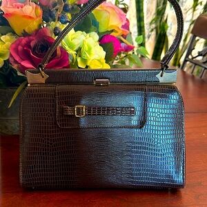 Naturalize purse. Beautiful condition. Snap works to close. Beautiful Brown.